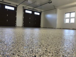 Epoxy garage floor with flakes.
