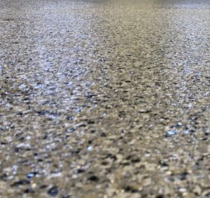 Epoxy garage floor with flakes.